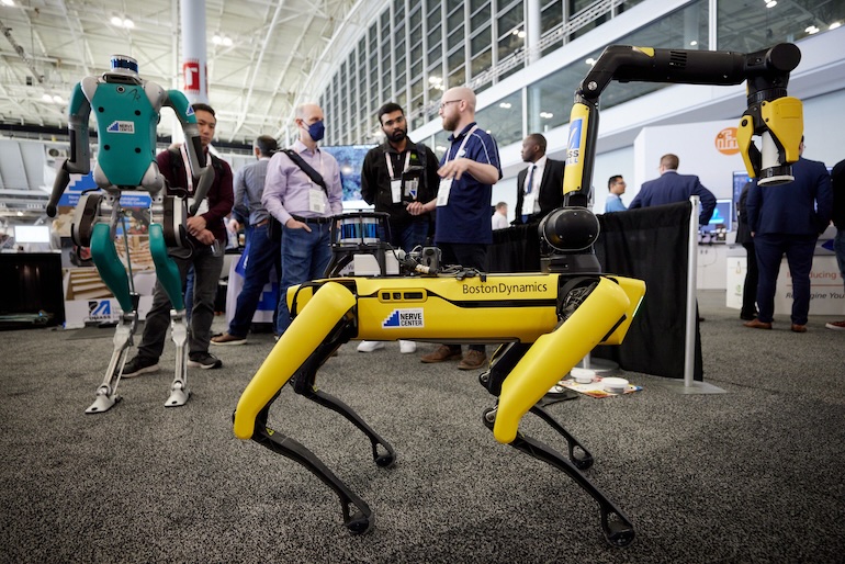 Boston Dynamics' Spot robot and Agility Robotics' Digit at the Robotics Summit & Expo.